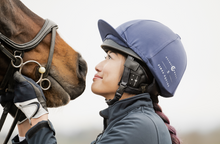 The world's first removable Bluetooth for your riding Helmet. Make and receive calls while in the saddle to your trainer, your family or other riders in your group. Listen to music and train Dressage to Music without your earphones falling out again. Perfect for cross country training and large arenas, HelmetConnect has no restriction on range. Easily removed before competition and compatible with Android, iPhone and Apple Watch.