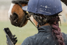 The world's first removable Bluetooth for your riding Helmet. Make and receive calls while in the saddle to your trainer, your family or other riders in your group. Listen to music and train Dressage to Music without your earphones falling out again. Perfect for cross country training and large arenas, HelmetConnect has no restriction on range. Easily removed before competition and compatible with Android, iPhone and Apple Watch.